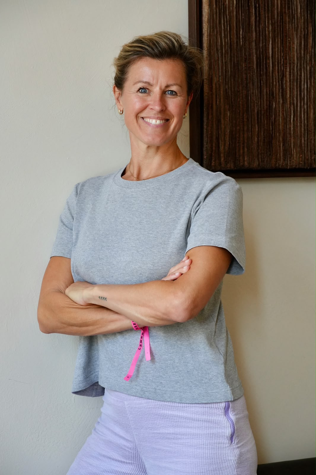Esther van Diepen smiling with arms crossed